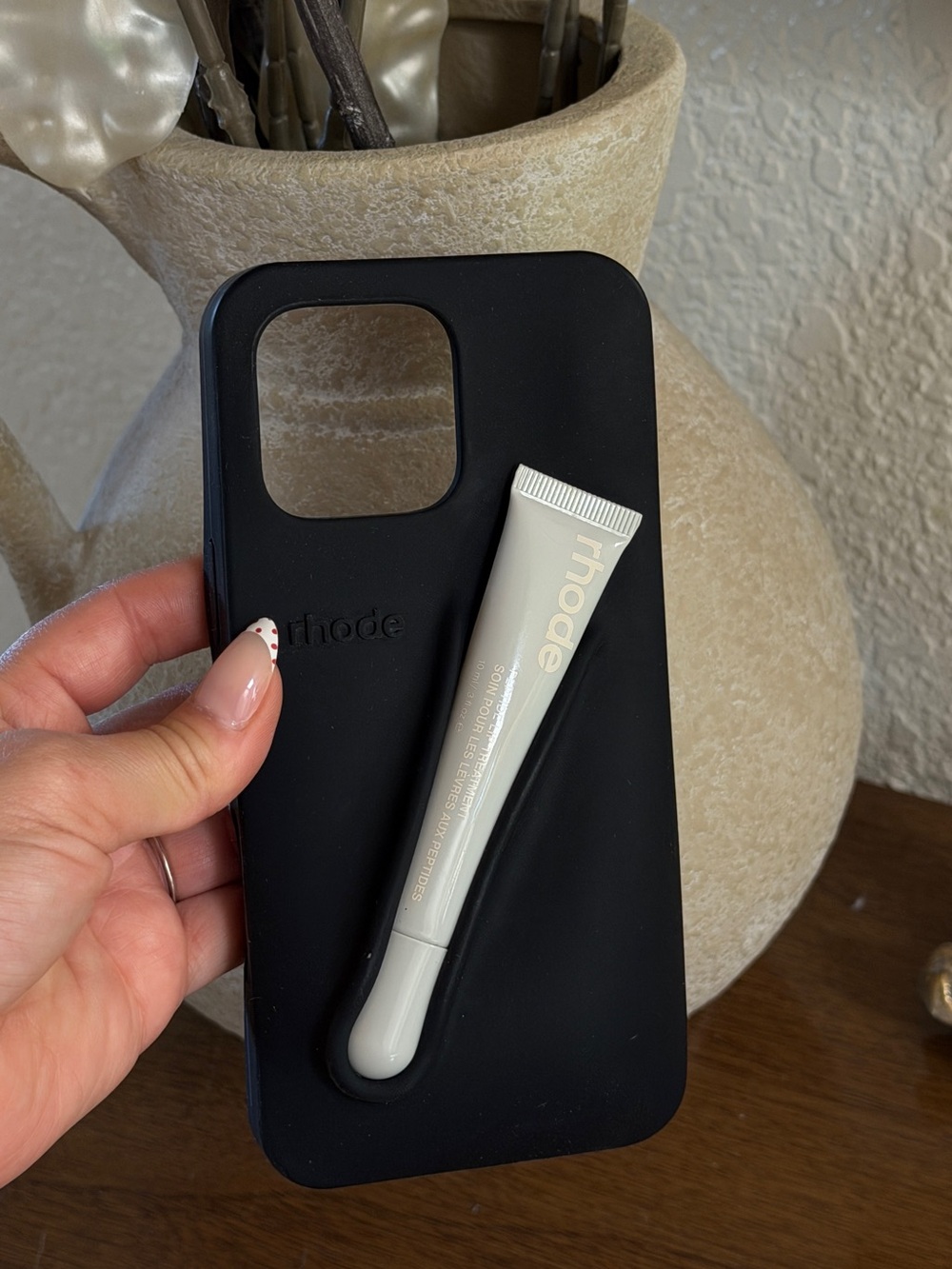 RHODE Black Silicone Phone Case with Cream Travel Tube